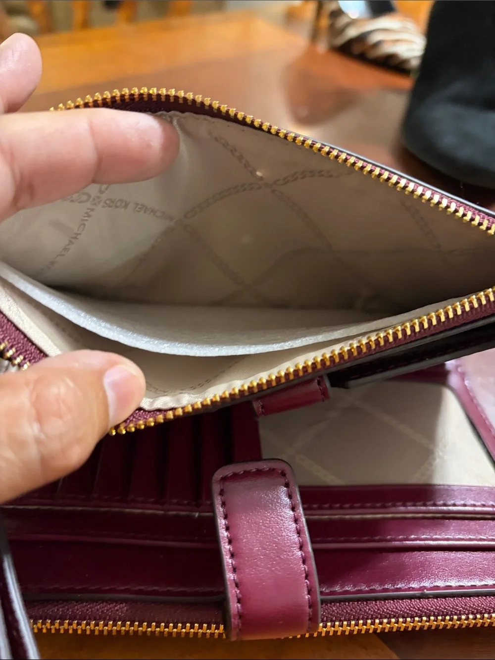Michael Kors Pebbled Leather Wristlet in Plum